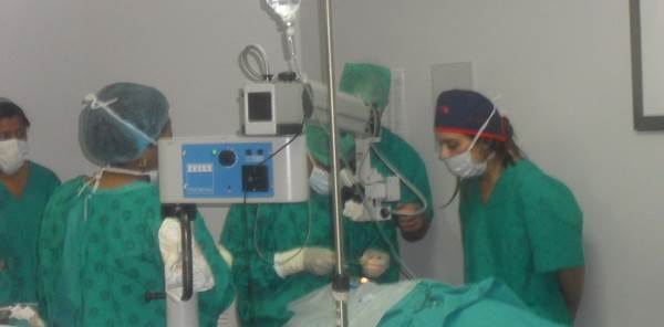 Doctors & Nurses At Theatre During Cataract Operation